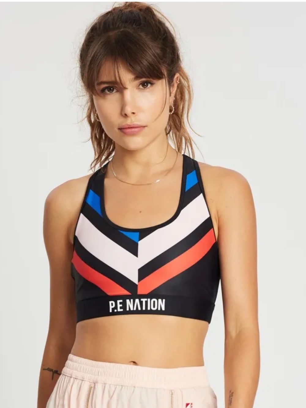 P.E NATION Black Colorblock Racerback Sports Bra with Red, Pink & Blue Accents